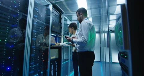 Data center colleagues with tablets Stock Footage 96651643