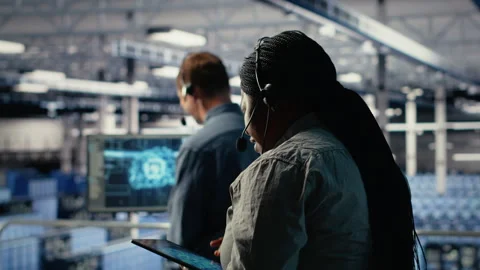 Data center colleagues using artificial intelligence to help customers Stock Footage 314686370