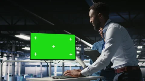Data center colleagues working on green screen PC, updating infrastructure Stock Footage 310785170
