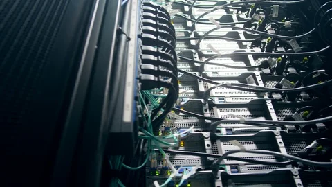 Data center computer with many plugged cords. 库存影片 111871022