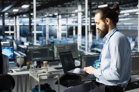 Data center computer scientist adjusting AI model parameters Foto stock