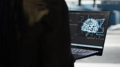 Data center computer scientist doing AI data analysis on laptop Foto stock