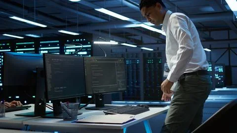 Data center computer scientist responsible for installation of equipment Stock Photos