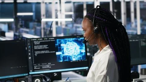 Data center computer scientist using AI assistant to provide user support Stock Photos