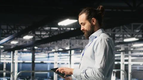 Data center computer scientists using devices to review AI LLM visualizations Stock Photos
