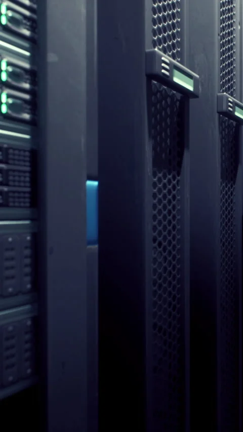 Data center with computer servers and green lights in a tech environment Stockbeeldmateriaal 337927503