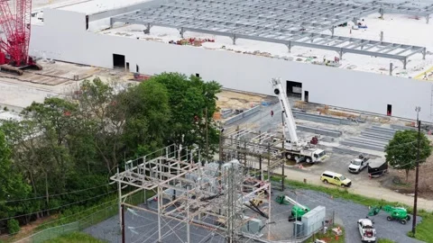Data center construction in Lancaster reveals rooftop steel framework, new Stock Footage 337976667