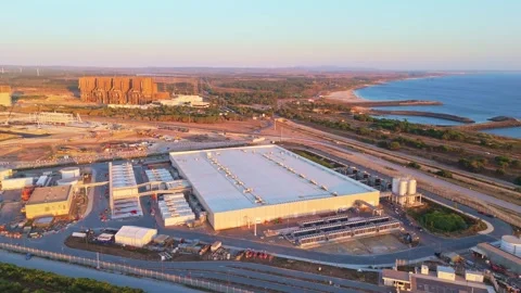 Data center construction site on coast of Portugal at Sunset. Aerial View Stock Footage 341150419