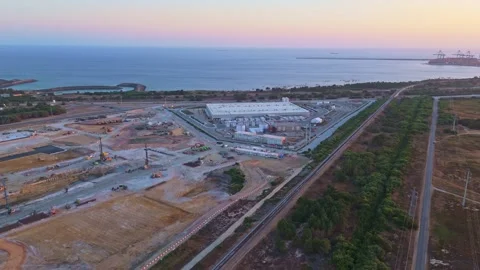 Data center construction site on coast of Portugal at Sunset. Aerial View Stock Footage 341150427