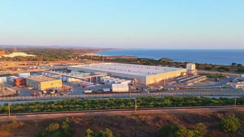 Data center construction site on coast of Portugal at Sunset. Aerial View Stock Footage 341150533