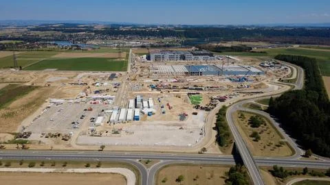Data center construction site with highway under a clear sky Stock Photos