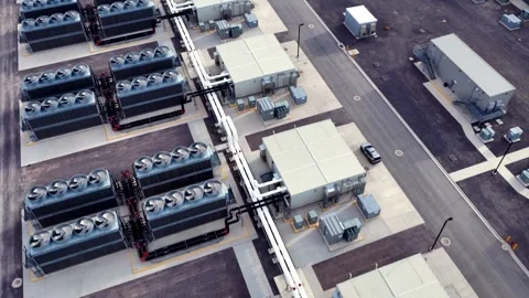 Data Center Cooling Systems then rises to reveal the hyperscale facility in Stock Footage 339898917