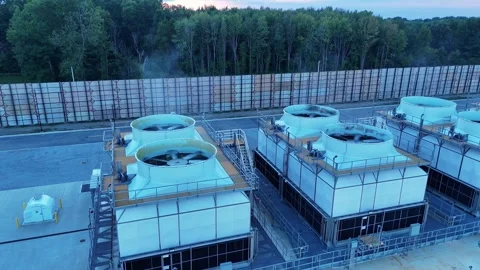 Data center cooling towers with large fans spinning for server climate control Stock Footage 346147961
