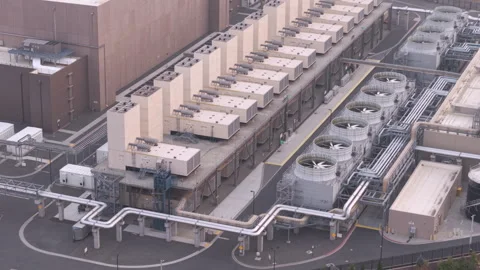 Data center with cooling towers, ventilation units, piping, and mechanical Stock Footage 345361011