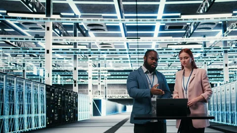 Data center coworkers collaborating to manage cloud computing IT solutions Stock Footage 330089419
