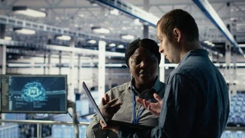 Data center coworkers doing brainstorming, monitoring deep learning processes Stock Footage 314804064