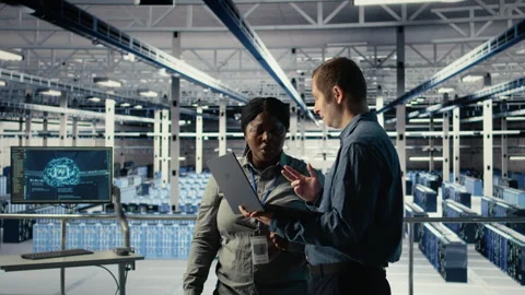 Data center coworkers doing brainstorming, monitoring deep learning processes Stock Footage 314805045