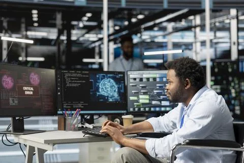 Data center developer with paraplegia seeing glitch warning while using AI Stock Photos