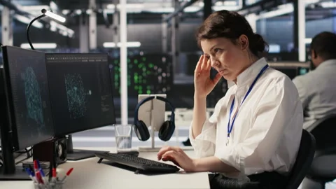 Data center developer thinking how to improve AI, pleased with result Stock Footage 309364274