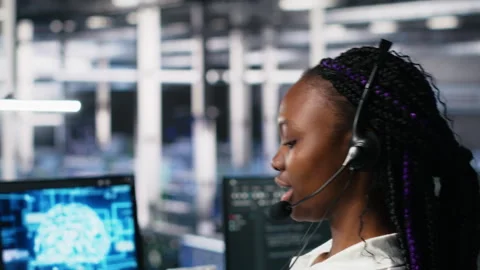 Data center developer using AI assistant to provide user technical support Stock Footage 313636710