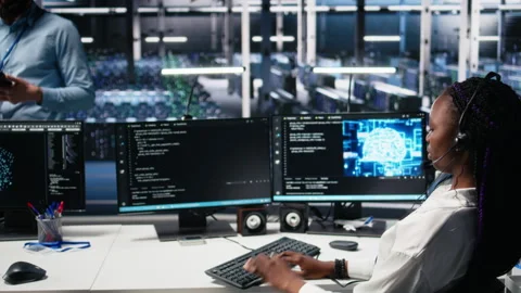 Data center developer using AI assistant to provide user technical support Stock Footage 313639643