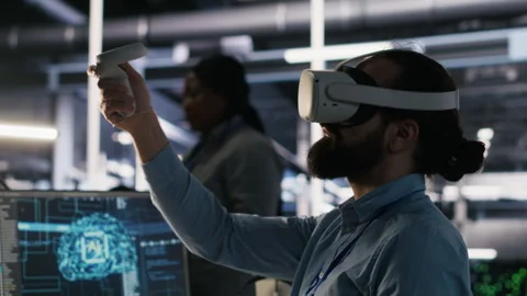 Data center developer using virtual reality technology for AI LLM visualization Stock Footage 309630063