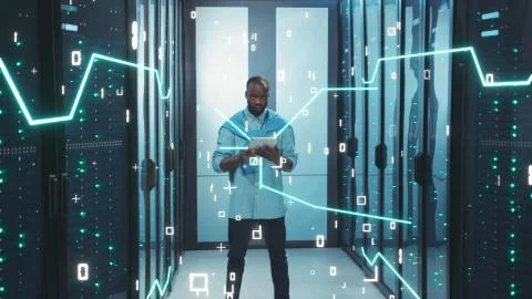 Data Center. Digitalization of Information. African Server Specialist with Stock Photos