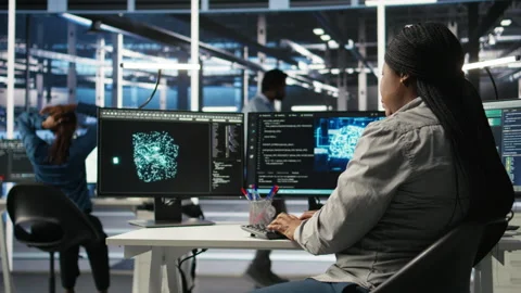 Data center employee deploying AI solutions optimizing equipment Video stock 307020626