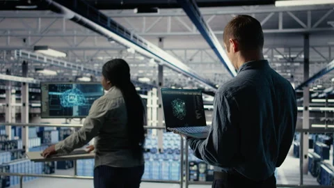 Data center engineer adjusts system settings to improve AI rigs processing speed Stock Footage 314683218