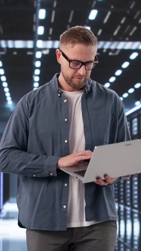 Data Center Engineer Carefully Monitors AI System Stock Footage 331517468
