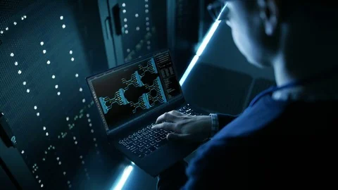 Data Center Engineer Holds Laptop and Works Controls System Stability.   Stock Footage 82788041