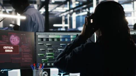 Data center engineer sees critical error message while using node tree software Stock Photos