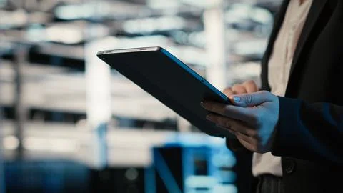 Data center engineer uses augmented reality virtualization to troubleshoot Stock Photos