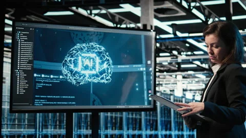 Data center engineer using artificial intelligence tech to monitor system Stock Footage 329326271