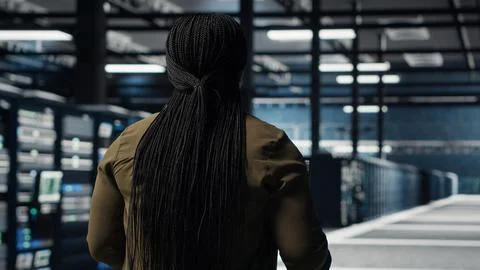 Data center engineer using deep learning on laptop to optimize operations Stock Photos