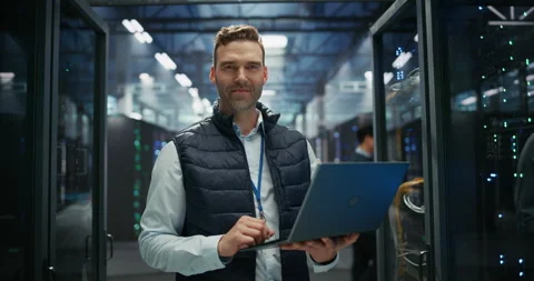 Data Center Engineer Using Laptop Computer Stock Footage 319995243