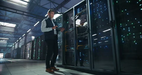 Data Center Engineer Using Laptop Computer Stock Footage 320000148