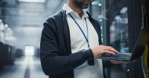 Data Center Engineer Using Laptop Computer Stock Footage 320867422