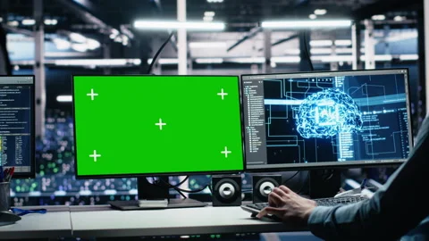 Data center engineer using machine learning algorithms on green screen PC Stock Footage 313637621