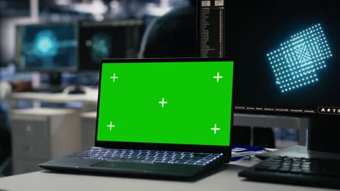 Data center engineer working on neural network on chroma key laptop Stock Footage 313566138