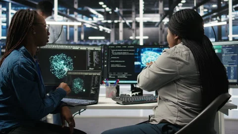 Data center engineering team deploying AI solutions optimizing gear Stock Footage 307042333