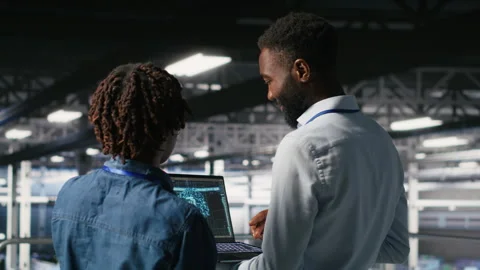 Data center engineering team doing maintenance on rigs handling AI tasks Stock Footage 310783763
