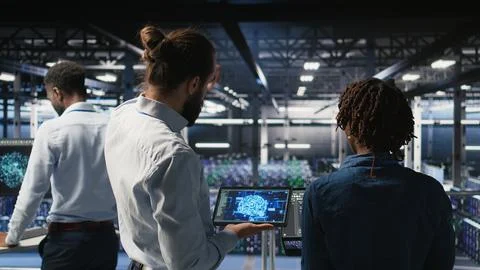 Data center engineering team doing maintenance on AI servers Stock Photos