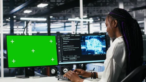Data center engineers managing AI systems using chroma key PC Stock Footage 313566680