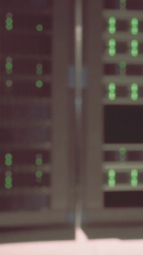 Data center equipment is arranged with glowing lights in a server room Stock Footage 337926078