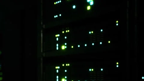 Data center equipment shows lights while working at night in a dark room Stock Footage 344998803