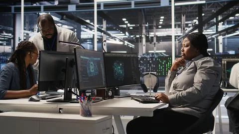 Data center expert doing software updates, verifying machine learning parameters Stock Photos