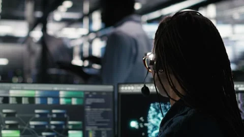 Data center expert examines node tree interface, delivering technical support Stock Footage 309511551
