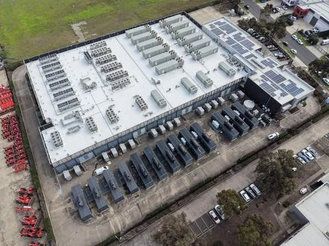Data center facility generating green energy with solar panels Stock Photos