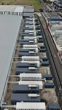 Data center facility with industrial cooling units and generators Stock Photos
